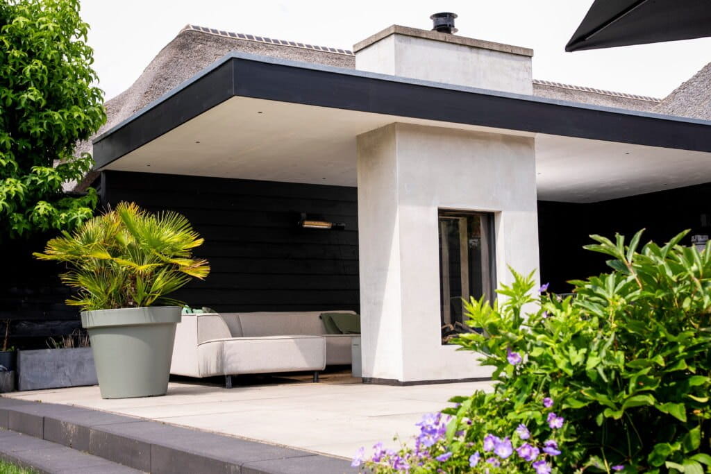 Veranda met doorkijkhaard